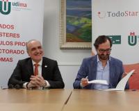 Salvador Molina y Arturo de las Heras, presidentes del Mad FinTech y el CEF.-, durante la firma.